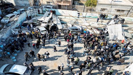 Palestinians inspect the damage following an Israeli raid in Jenin in the Israeli-occupied West Bank January 26, 2023. REUTERS/Mohamad Torokman